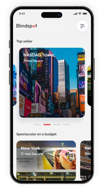 Blindspot mobile app interface displaying billboard options, featuring NASDAQ Tower in Times Square as the top seller